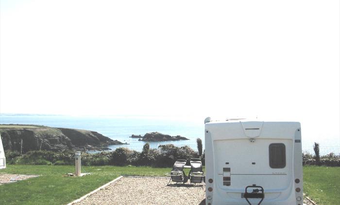 A hardstanding pitch that allows awnings overlooking the Bay